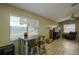 Bright living room with a dining table set and natural light at 3539 59Th W Ave # 3539, Bradenton, FL 34210