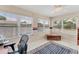 Sunlit bonus room featuring natural light, neutral paint, tile floors, and a decorative rug at 401 N Jefferson Ave, Sarasota, FL 34237