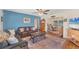 Spacious living area with hardwood floors, stylish furniture, and an inviting open layout at 401 N Jefferson Ave, Sarasota, FL 34237