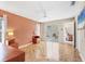 Bedroom with parquet floors and a sliding glass door to a screened-in patio at 4107 Brittany Ln # 18, Sarasota, FL 34233