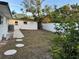 Expansive fenced backyard offering privacy and ample space for outdoor activities and landscaping at 4158 Prudence Dr, Sarasota, FL 34235