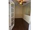 Home office or den featuring french doors and mirrors at 4158 Prudence Dr, Sarasota, FL 34235