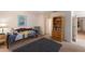 Bright bedroom with a comfortable bed, playful decor, and ample space, creating a welcoming atmosphere at 4410 67Th Avenue E Cir, Sarasota, FL 34243