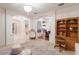 Inviting foyer with arched doorways, chandelier, and elegant decor showcasing a welcoming entrance at 4410 67Th Avenue E Cir, Sarasota, FL 34243