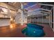 A sparkling pool is surrounded by a screened enclosure, providing a luxurious outdoor living space at 4410 67Th Avenue E Cir, Sarasota, FL 34243
