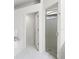 This bathroom features white patterned tile flooring, a soaking tub, and stand up shower at 5004 Creekside Trl, Sarasota, FL 34243