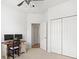 Bright room featuring neutral carpet and a workspace with dual monitors at 5004 Creekside Trl, Sarasota, FL 34243