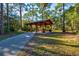 Charming park pavilion featuring picnic tables, a walkway and open space for outdoor gatherings and recreation at 5004 Creekside Trl, Sarasota, FL 34243