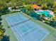 Community amenities feature a tennis court, basketball court, and swimming pool with cabana and playground at 5004 Creekside Trl, Sarasota, FL 34243