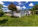 Backyard view of the home's exterior at 508 50Th Avenue W Plz, Bradenton, FL 34207