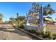 A view of the welcoming Fair Lane Acres 55+ Older Community sign amid manicured landscaping on a sunny day at 508 50Th Avenue W Plz, Bradenton, FL 34207