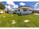 Well-maintained home exterior with green lawn, garden beds and features a shed for extra storage space at 508 50Th Avenue W Plz, Bradenton, FL 34207