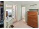 Hallway with carpet, built in closet, and wooden dresser at 508 50Th Avenue W Plz, Bradenton, FL 34207