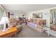 Welcoming living room featuring comfortable furniture, warm lighting, and an open layout at 508 50Th Avenue W Plz, Bradenton, FL 34207