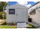 Exterior view of the storage shed with access door at 508 50Th Avenue W Plz, Bradenton, FL 34207
