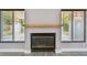 A close up view of the fireplace and mantel in the living room at 528 Manor Dr, Dunedin, FL 34698