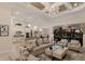 Open-concept living area showcasing a kitchen, living room, and dining area at 5804 Mulligan Way, Lakewood Ranch, FL 34211