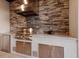 An up close outdoor kitchen with stainless steel grill and granite countertops at 5804 Mulligan Way, Lakewood Ranch, FL 34211