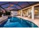 Wonderful screened in-ground pool and spa with ample seating on the brick patio, a perfect entertainment space at 5804 Mulligan Way, Lakewood Ranch, FL 34211
