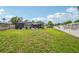 Expansive backyard with a pool area and plenty of green space for outdoor activities at 6002 34Th W Ave, Bradenton, FL 34209