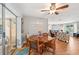 Inviting dining room with wood table, comfortable seating, and a view to the cozy living room at 6002 34Th W Ave, Bradenton, FL 34209