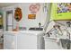 Convenient laundry room with modern appliances and a utility sink for easy clean up at 6002 34Th W Ave, Bradenton, FL 34209
