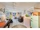 Open-concept living area with a blend of seating and dining spaces perfect for entertaining at 6002 34Th W Ave, Bradenton, FL 34209