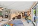 Spacious living room with sliding glass doors that bring in natural light and provide outdoor access at 6002 34Th W Ave, Bradenton, FL 34209