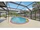 The sparkling pool has stairs, brick trim, and a sunny patio with a playful pool float at 6002 34Th W Ave, Bradenton, FL 34209