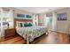 Comfortable bedroom with a cozy bed and serene decor at 617 Fairmount Dr, North Port, FL 34287
