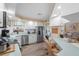 Well-lit kitchen featuring modern stainless steel appliances and updated countertops at 617 Fairmount Dr, North Port, FL 34287