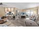 Comfortable living room area with cozy seating and an entertainment center at 617 Fairmount Dr, North Port, FL 34287