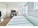 Bedroom with bed, desk and storage space at 6253 Whetstone Ct, Palmetto, FL 34221