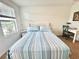 Comfortable bedroom featuring natural light, desk, and a peaceful ambiance at 6253 Whetstone Ct, Palmetto, FL 34221
