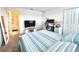 Bright bedroom showcasing closet, ensuite bathroom, carpet, and a calming ambiance at 6253 Whetstone Ct, Palmetto, FL 34221