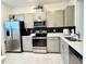 Stylish kitchen featuring stainless appliances, with a clean, modern design at 6253 Whetstone Ct, Palmetto, FL 34221