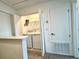 Convenient laundry room featuring a washer and dryer and plenty of storage at 6253 Whetstone Ct, Palmetto, FL 34221