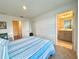 Main bedroom showcasing natural light and a connecting bathroom at 6253 Whetstone Ct, Palmetto, FL 34221