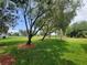 Scenic view of green space and mature trees perfect for outdoor activities at 6507 Stone River Rd # 302, Bradenton, FL 34203