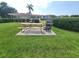Outdoor grilling area with a picnic table for residents' enjoyment at 6507 Stone River Rd # 302, Bradenton, FL 34203