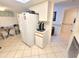 Functional kitchen equipped with white appliances, ample storage, and a convenient layout for efficient meal preparation at 6507 Stone River Rd # 302, Bradenton, FL 34203