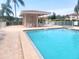 The inviting pool with clear water sits adjacent to an open air cabana at 6507 Stone River Rd # 302, Bradenton, FL 34203