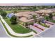 Expansive waterfront home boasts manicured landscaping and a three-car garage at 6512 Grand Estuary Trl # 101, Bradenton, FL 34212