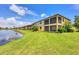 Two-story home with screened patios and a waterside view at 6512 Grand Estuary Trl # 101, Bradenton, FL 34212