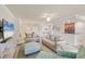 Open floorplan featuring a living room that flows into the dining room and kitchen at 6512 Grand Estuary Trl # 101, Bradenton, FL 34212