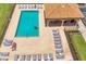 Overhead shot of a luxurious community pool and lounge area for resident relaxation and enjoyment at 6512 Grand Estuary Trl # 101, Bradenton, FL 34212