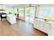 Bright eat-in kitchen featuring granite countertops, stainless appliances, and lots of natural light at 8509 La Boca Ave, North Port, FL 34287