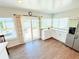 Bright eat-in kitchen featuring lots of natural light and stainless steel appliances at 8509 La Boca Ave, North Port, FL 34287