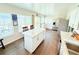 Open eat-in kitchen featuring an island, granite countertops, stainless appliances, and lots of natural light at 8509 La Boca Ave, North Port, FL 34287