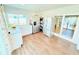 Bright eat-in kitchen with stainless steel appliances, granite countertops, and ample storage at 8509 La Boca Ave, North Port, FL 34287